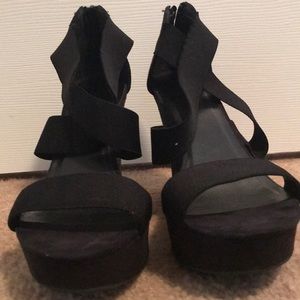 Black wedge heels, back zipper, elastic straps